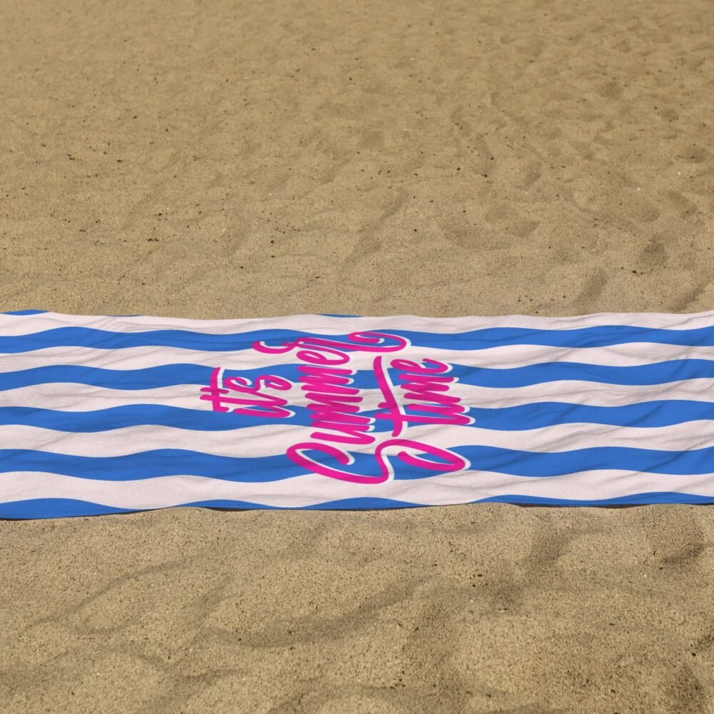 white beach towel psd mockup laying on the sand